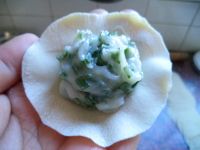 鲜鱿鱼饺子怎么做好吃_鲜鱿鱼饺子的做法